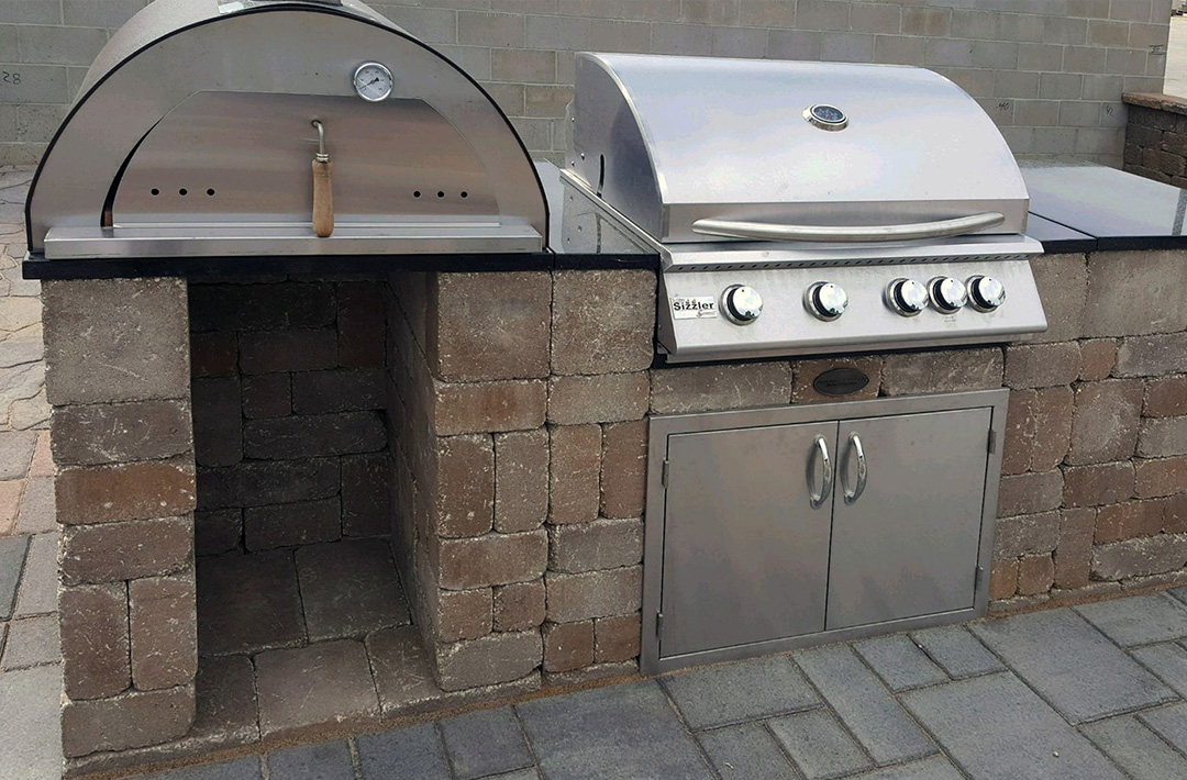 Stone patio grill and oven