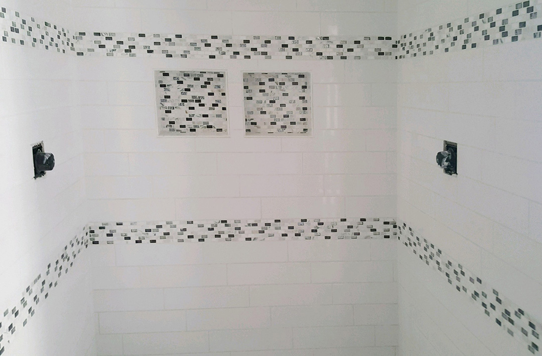 White and black tile shower